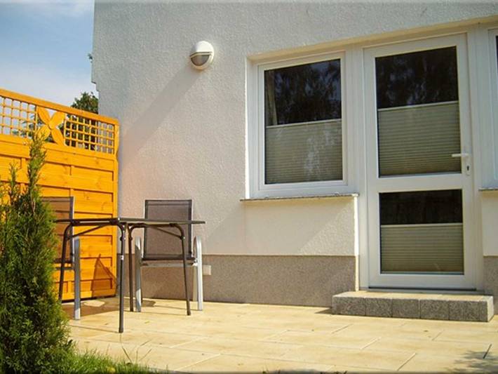 Ferienwohnung für 3 Personen, mit Terrasse und Garten sowie Seeblick in Breege