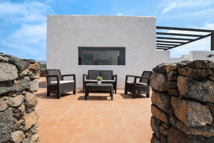 Ferienvilla 'Playa Marina Eco Bungalow Mala' mit Meerblick, Gemeinschaftspool und Wlan in Haría, Lanzarote