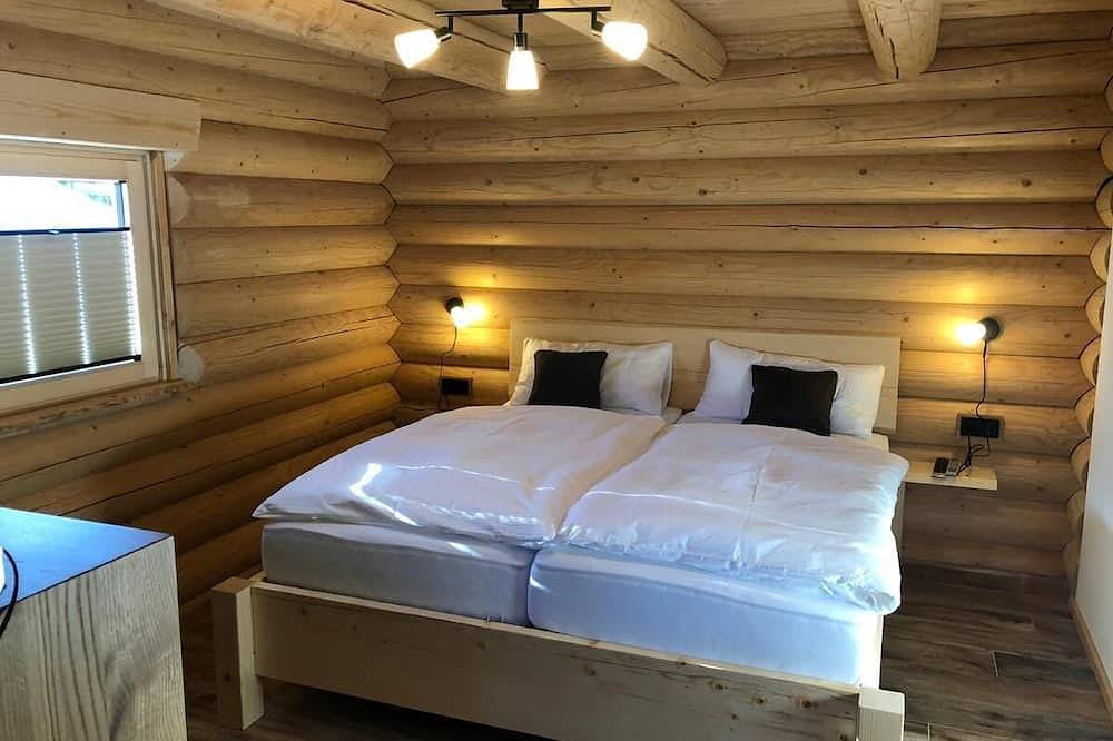 Apartamento inteiro, Modern log chalet (75m2) with its own sauna in Lindberg, Baviera Oriental