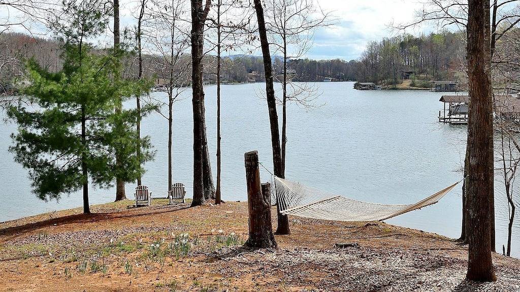 Beautiful Home On Gently Sloping Point Lot With 500 Feet Of Private Waterfront in Smith Mountain Lake