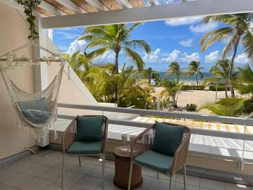 Gîte pour 2 personnes, avec terrasse et vue ainsi que piscine et jardin dans Nettlé Bay