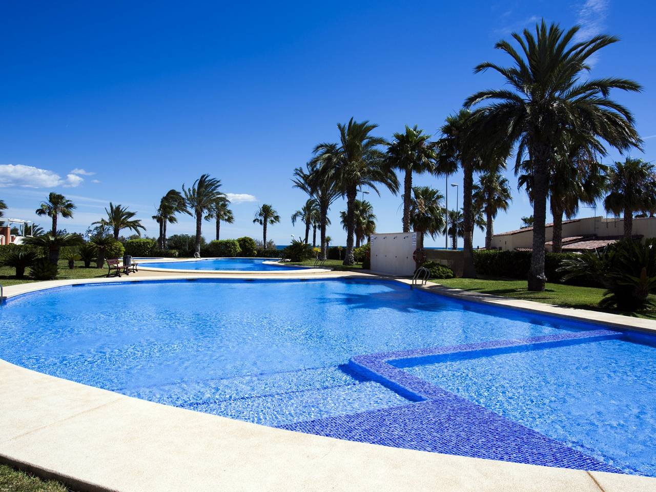 Entire apartment, Beachfront Apartment in Denia with Pool and Parking in Almadrava, Costa Blanca