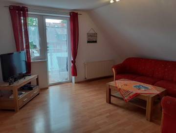 Ferienwohnung für 3 Personen, mit Garten und Balkon, kinderfreundlich in Hooksiel