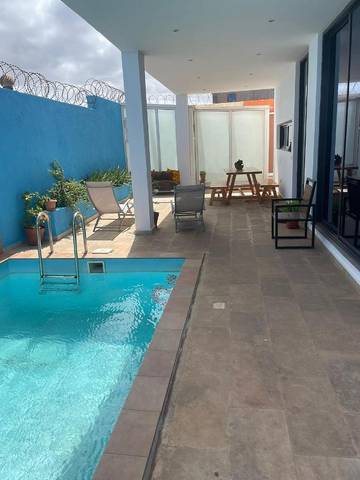 Chambre d’hôte pour 7 personnes, avec balcon ainsi que piscine et vue dans Praia