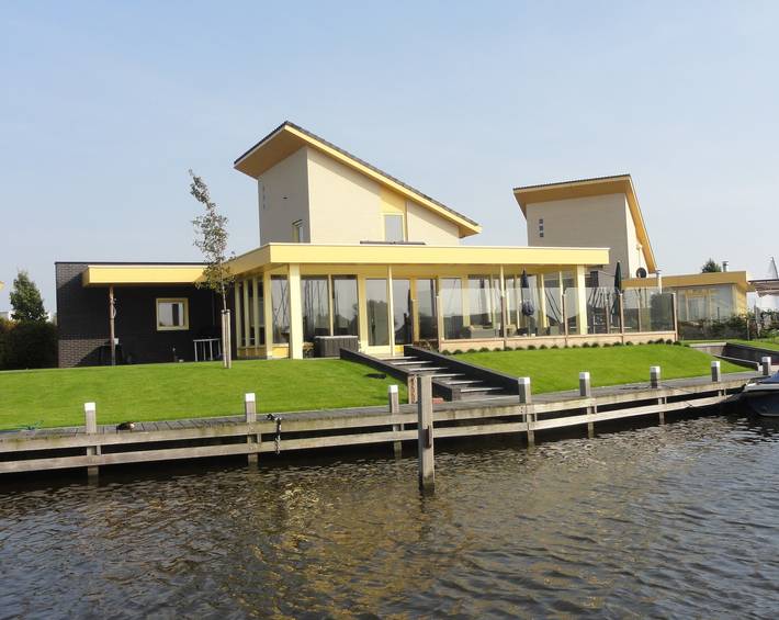 Ferienhaus für 7 Personen, mit Seeblick und Garten