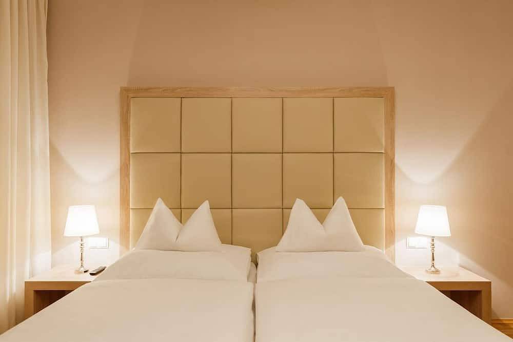 Dreibettzimmer - Pfeilers Bürgerstüberl und Hotel in Südoststeiermark, Feldbach