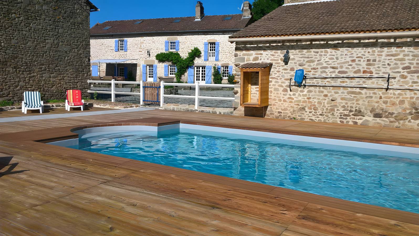 Maison de vacances « Le Gîte D'au, piscine chauffée » avec vue sur le lac, piscine partagée et Wi-Fi in Saint-Amand-Magnazeix, Région de Bellac