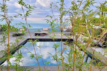 Location de vacances pour 20 personnes, avec jardin et balcon dans Bois de Nèfles