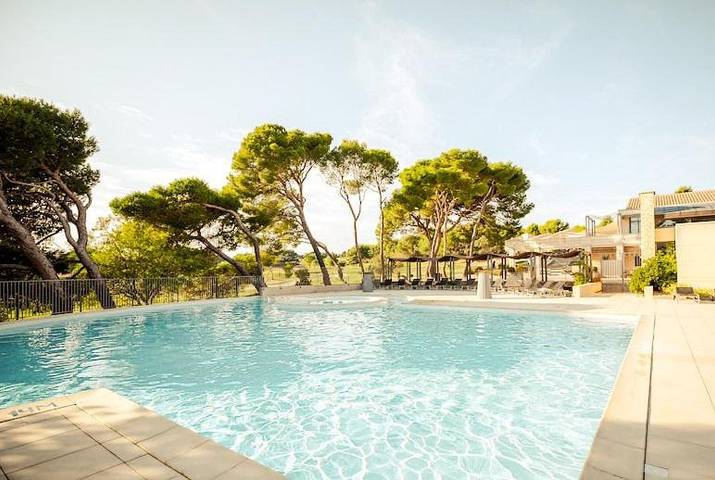 Appartement de vacances pour 4 personnes, avec Balcon et Terrasse ainsi que Jardin et Bassin pour enfant