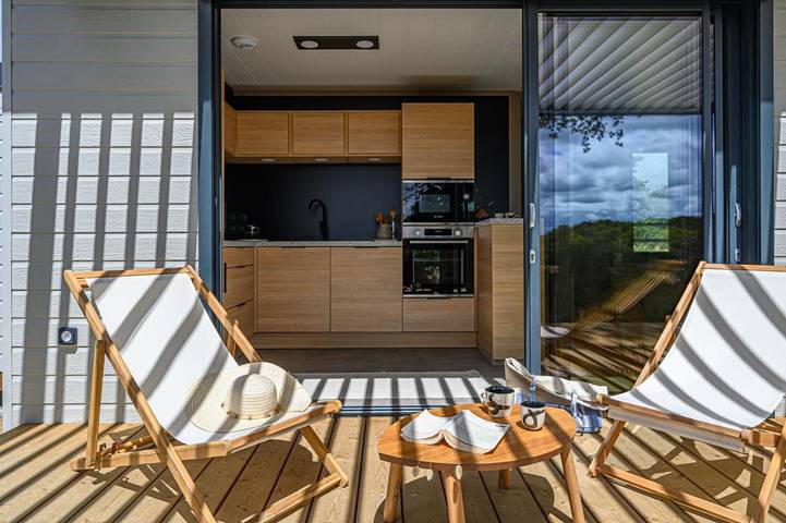 Chalet pour 4 personnes, avec jardin ainsi que vue et piscine