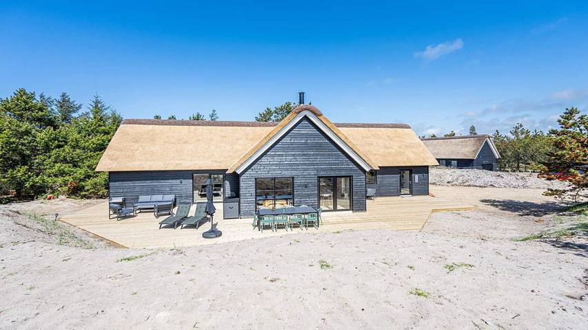 Ferienhaus für 8 Personen, mit Terrasse und Whirlpool sowie Sauna in Henne Strand