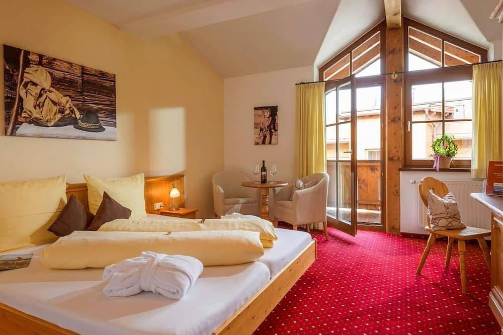 Doppelzimmer, 22 - 28m², mit Balkon - Hotel Reitlwirt in Brixen im Thale, Kaisergebirge