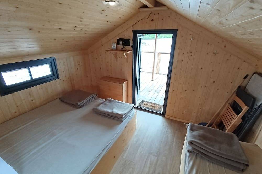 Cabin on the water with panoramic view on the lake in Flayat, Millevaches en Limousin Regional Nature Park