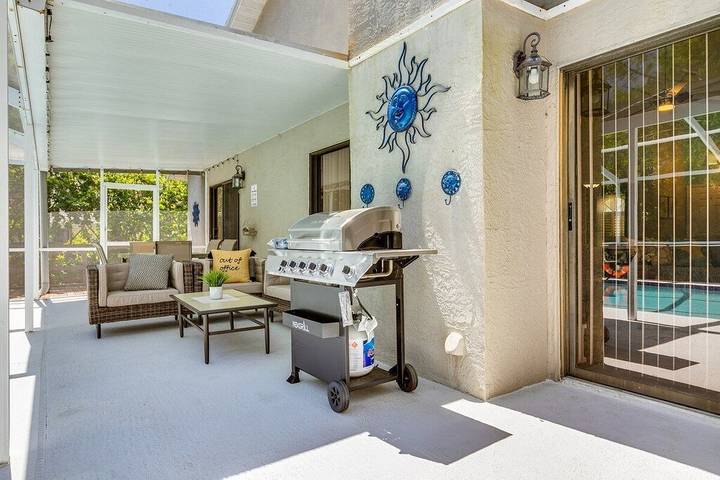 Vacation rental for 8 people, with hot tub and terrace as well as yard in Palm Harbor