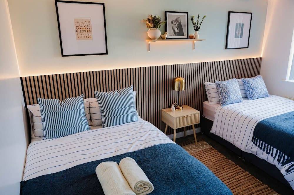 Boutique group home with air conditioning, free parking and designer interiors in Manchester, Greater Manchester