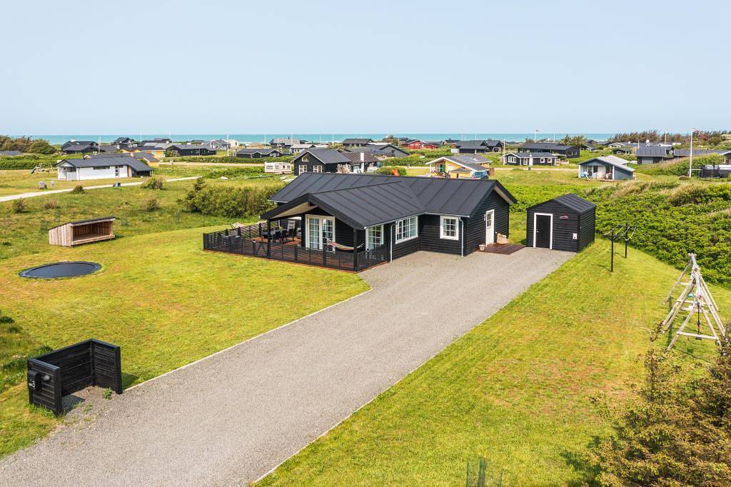 Modern holiday home with enclosed terrace near the beach in lønstrup, Hjørring Region