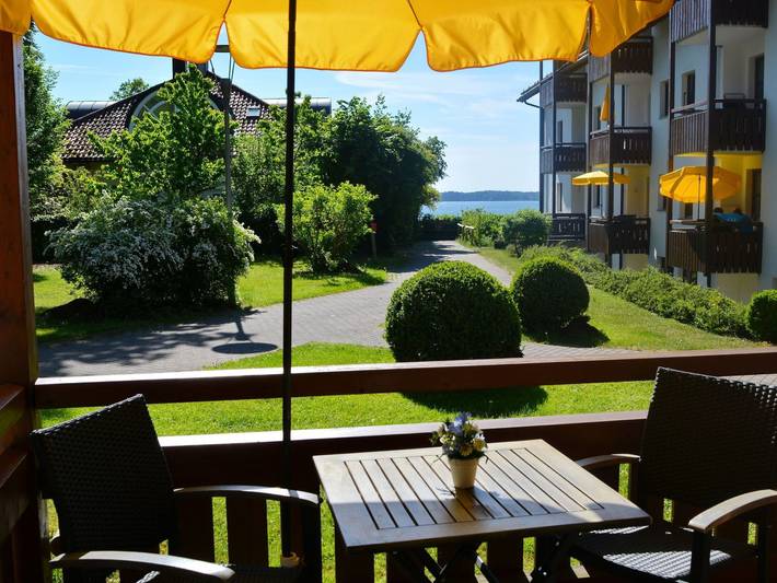 Ferienwohnung für 3 Personen, mit Balkon und Garten sowie Sauna und Seeblick