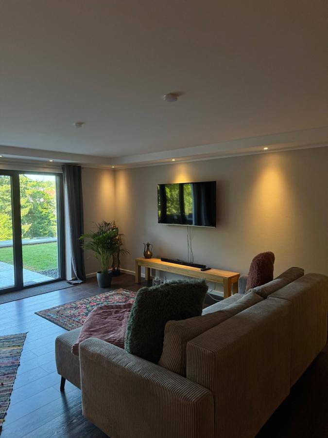 Ferienwohnung für 3 Personen, mit Terrasse und Garten sowie Ausblick