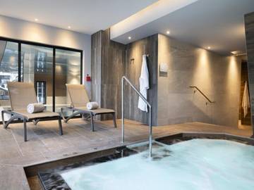 Chalet pour 6 personnes, avec balcon ainsi que piscine et sauna, animaux acceptés à Les Contamines-Montjoie