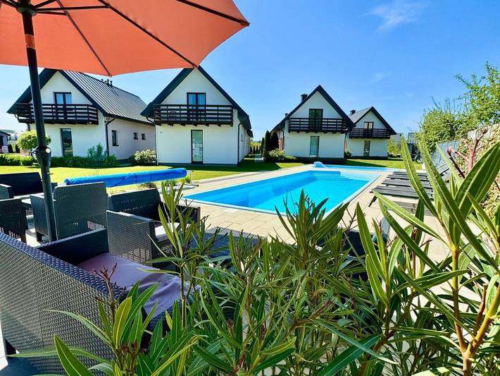 Ferienhaus für 8 Personen, mit Balkon und Whirlpool sowie Terrasse und Garten