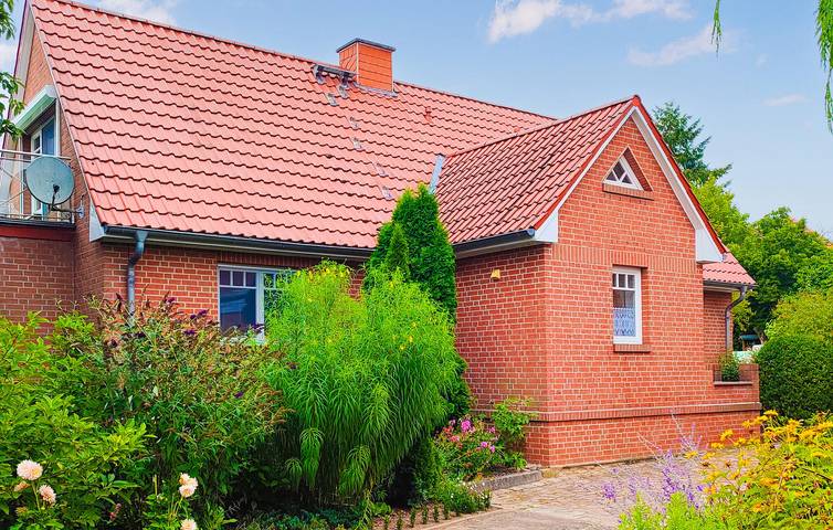 Ferienhaus für 4 Personen, mit Terrasse und Garten sowie Seeblick in Wokuhl-Dabelow