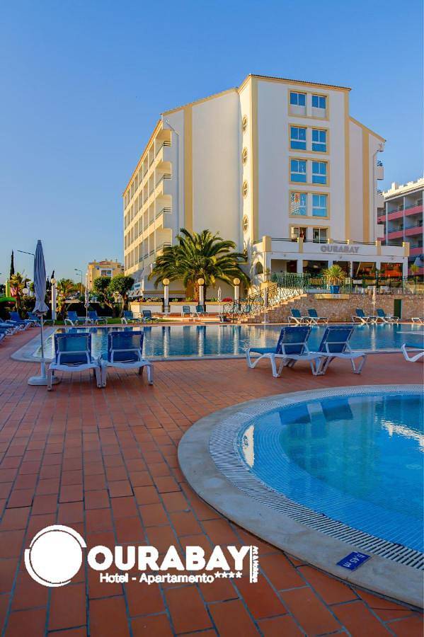 Aparthotel para 8 pessoas, com piscina infantil e piscina e ainda vista and jardim em Albufeira