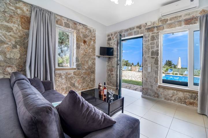 Entire apartment, Gkountis Stone Apartment 3: Sea View, Shared Pool & Wi-Fi in Greece
