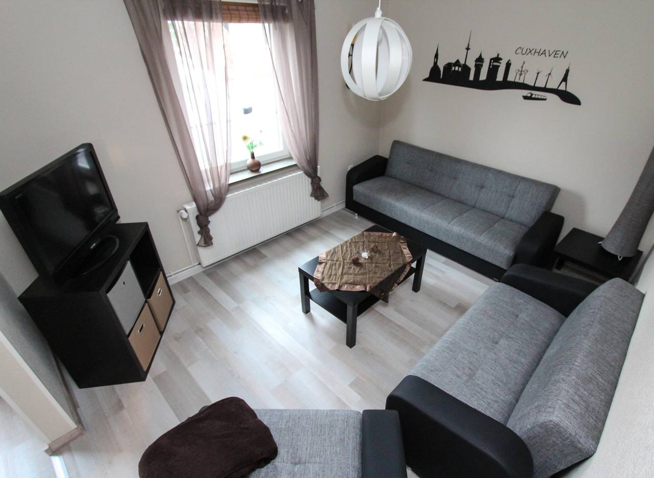 Ferienhaus 'Olenbrook' mit gemeinsamer Terrasse, Gemeinschaftsgarten und Wlan in Altenbruch, Cuxhaven