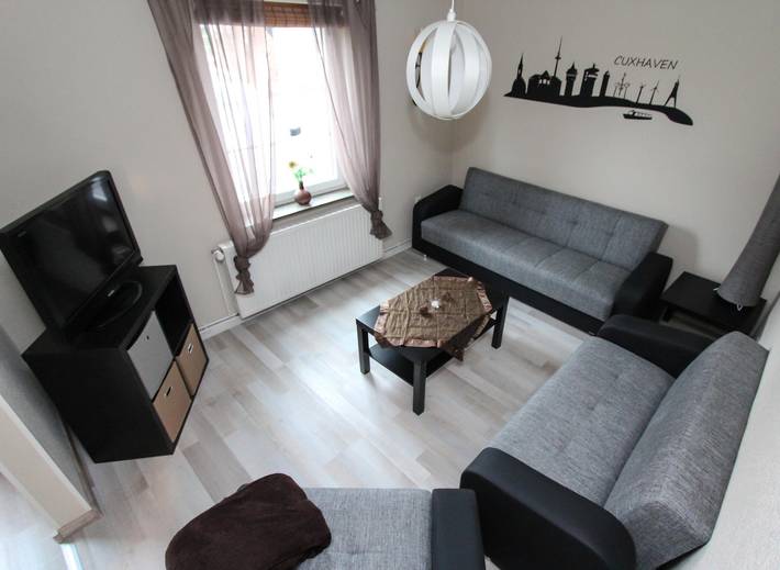 Ferienhaus 'Olenbrook' mit gemeinsamer Terrasse, Gemeinschaftsgarten und Wlan in Altenbruch, Cuxhaven