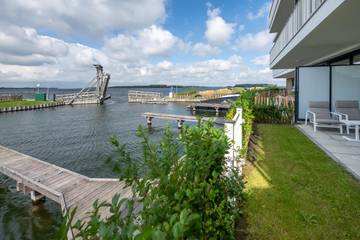 Ferienhaus für 4 Personen, mit Balkon/Terrasse und Seeblick sowie Balkon, mit Haustier in Zeeland