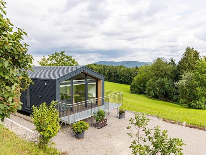 Ferienhaus für 7 Personen, mit Balkon und Garten