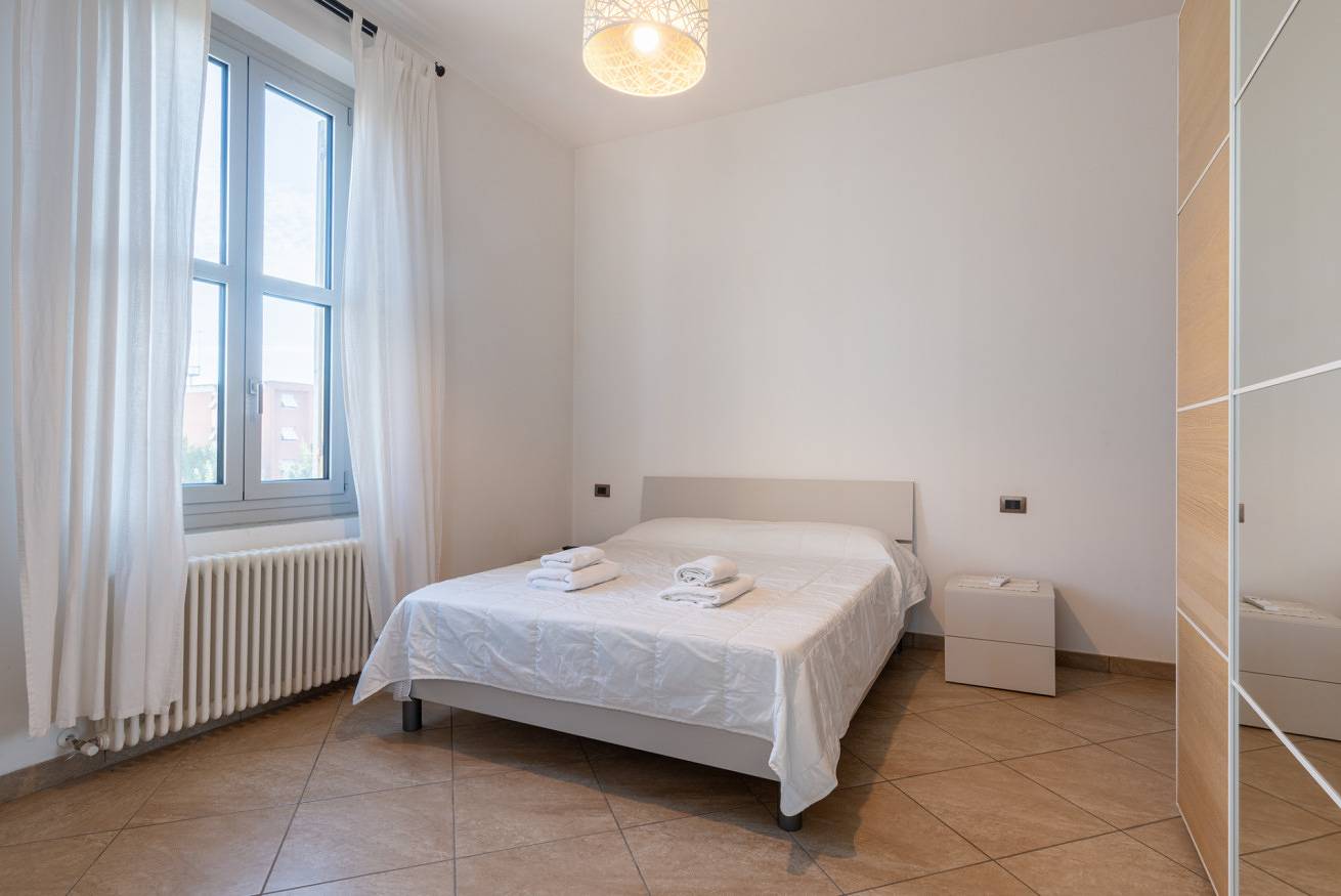 Apartamento entero, Guesthost - Bright and Cozy Apartment with Parking in Parma, Provincia de Parma
