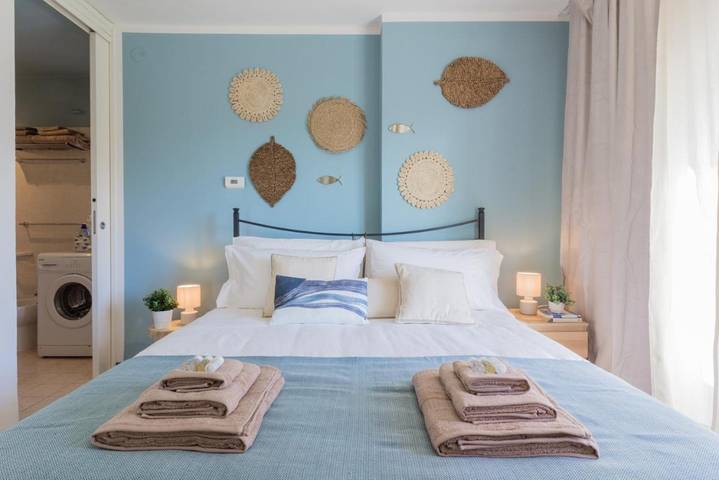 Ferienwohnung für 6 Personen, mit Terrasse und Garten sowie Pool und Seeblick