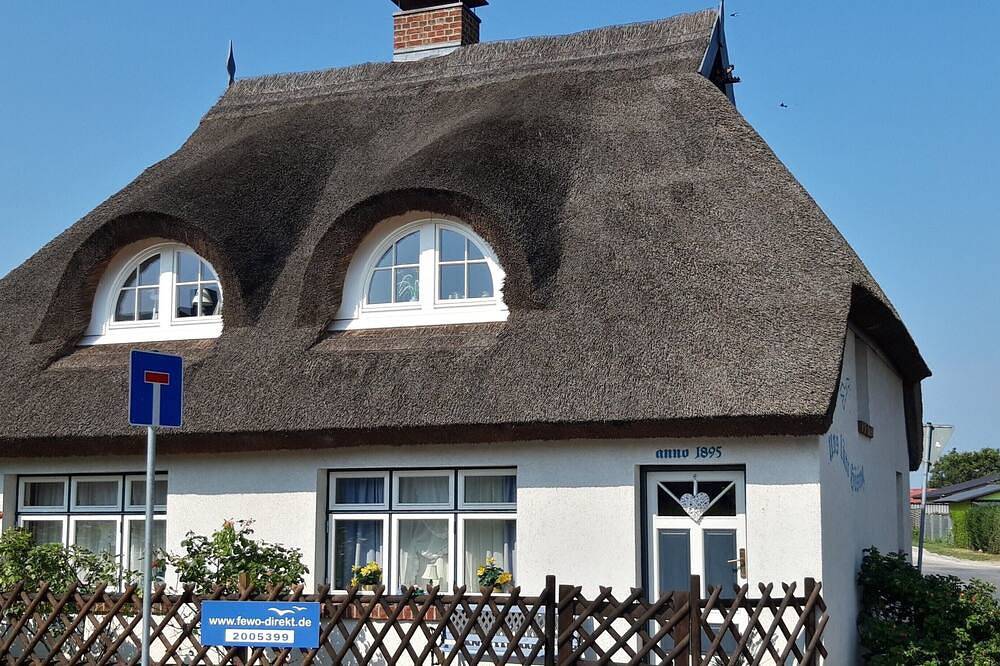 Nostalgia in a romantic holiday home with a thatched roof and fireplace in front of the island of Usedom in Spandowerhagen, Kröslin