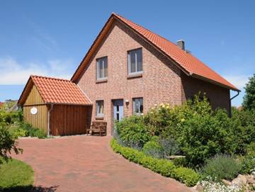 Ferienwohnung für 5 Personen, mit Terrasse und Sauna sowie Garten in Groß Schwansee