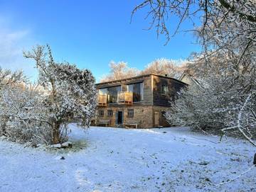 Ferienwohnung für 7 Personen, mit Ausblick und Seeblick sowie Garten, kinderfreundlich in Groß Mohrdorf