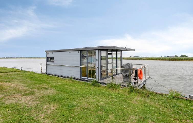 Woonboot voor 4 personen, met Uitzicht en Uitzicht op het meer in Friesland