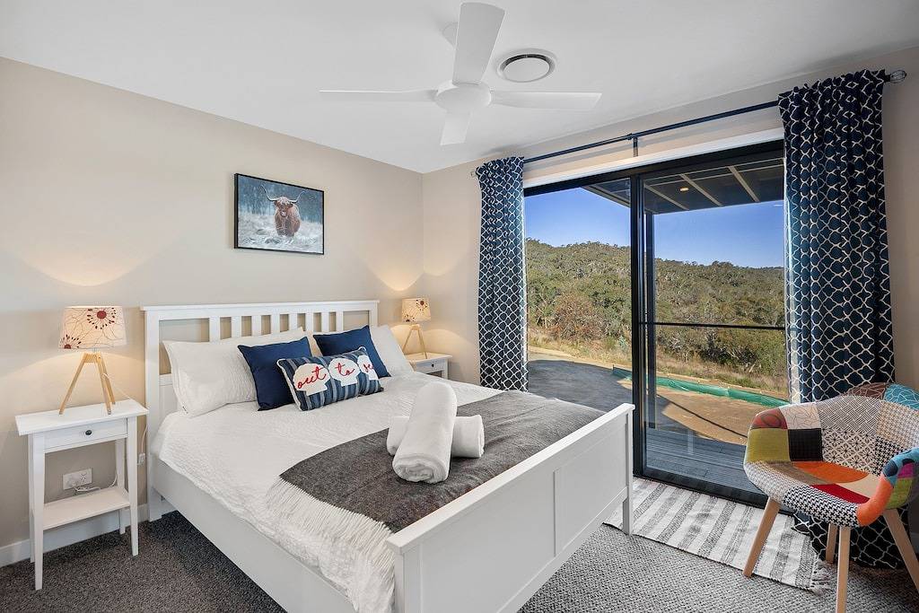 Mountain bike in & out, off Rainbow drive, on lake in East Jindabyne, New South Wales