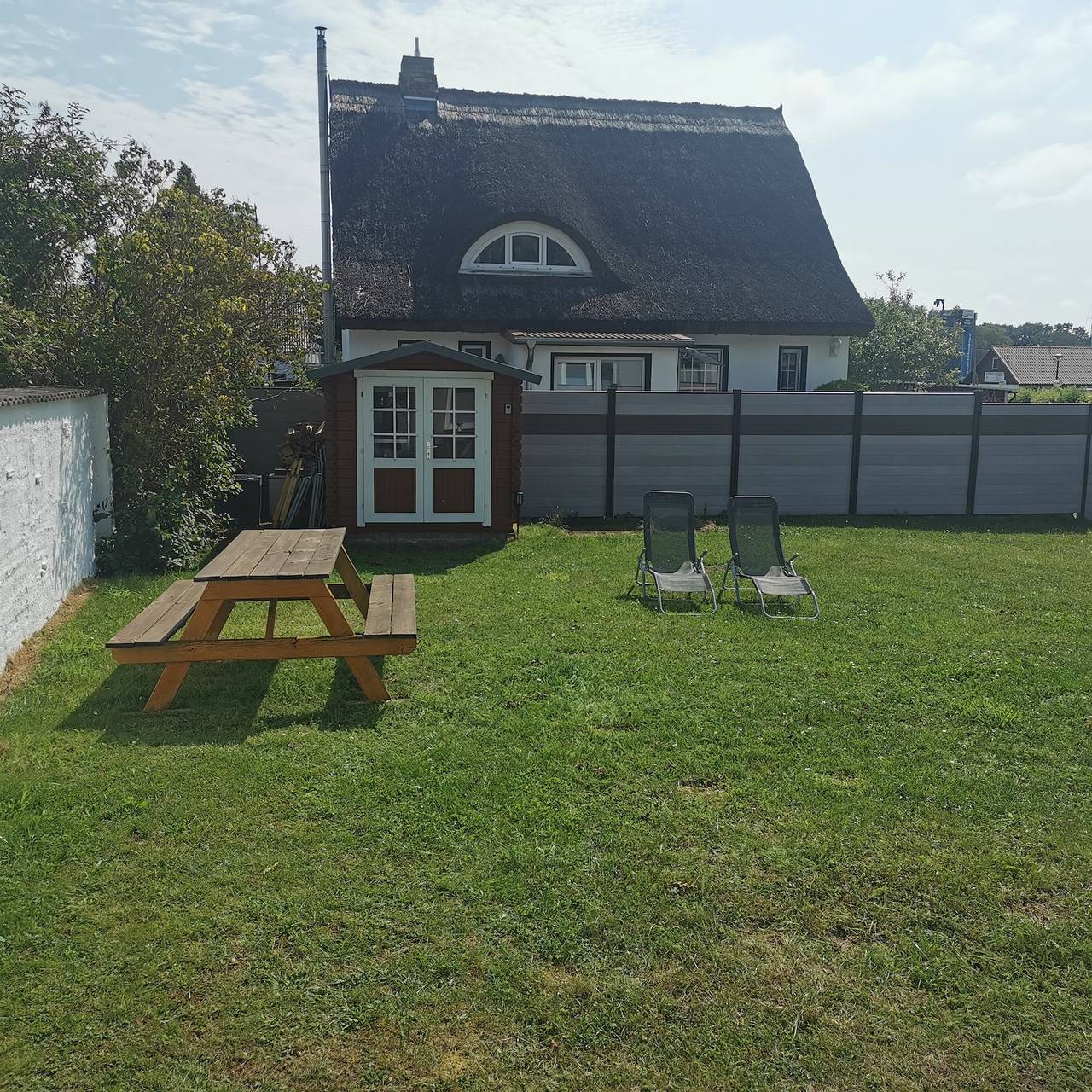 Ganze Wohnung, Ferienwohnung 'Boddenferienhaus - 11 Seemannsgarn' mit gemeinsamer Terrasse, Garten und Wlan in Schaprode, Rügen