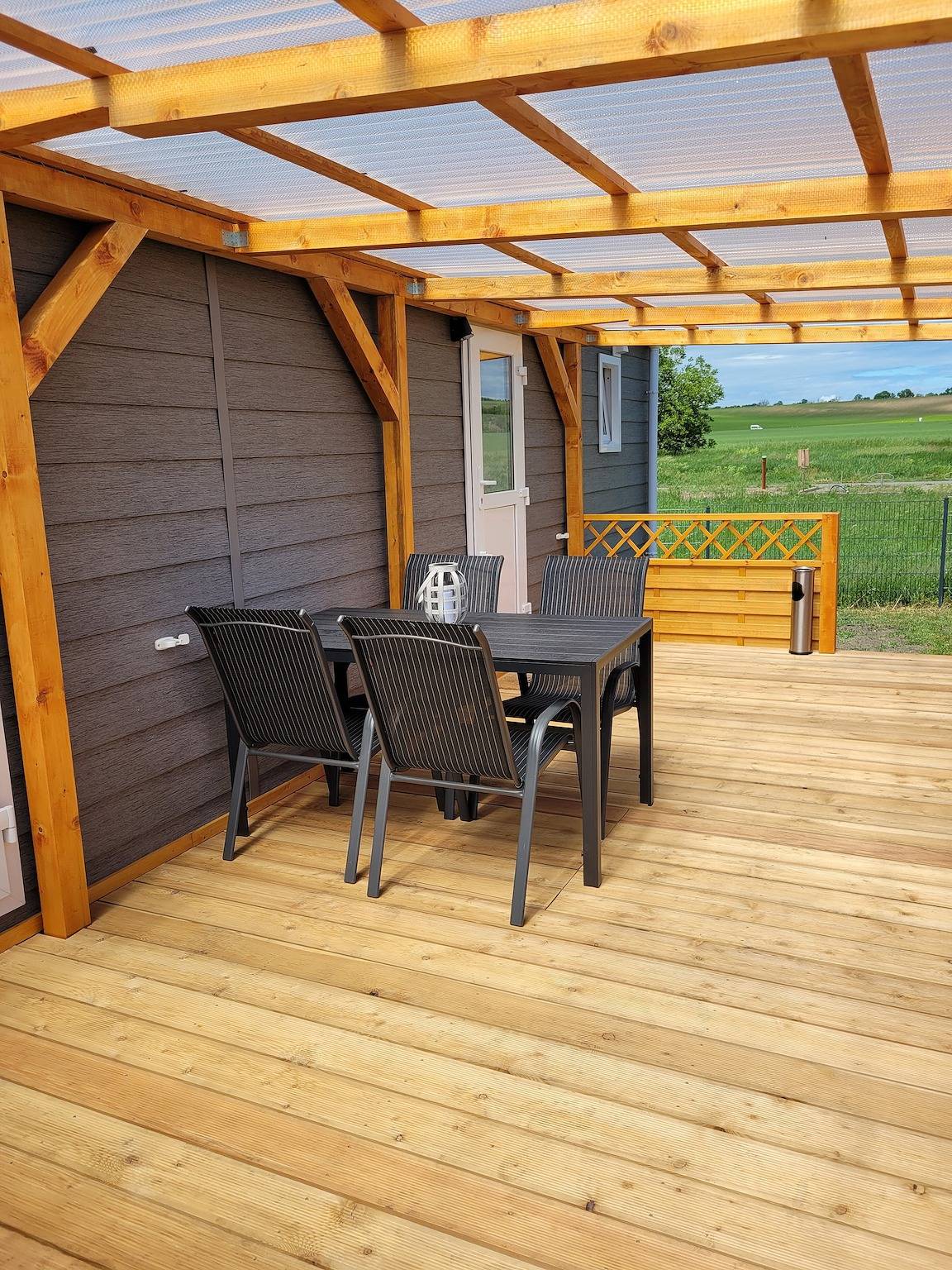 Ferienhaus Concordia direkt am See, mit überdachter Terrasse und Klimaanlage in Schadeleben, Seeland (Deutschland)