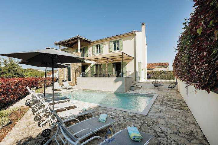 Ferienhaus für 8 Personen, mit Garten und Balkon