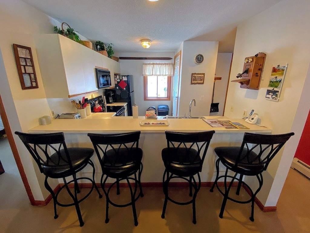 Ganze Wohnung, S4 Ski Slope Views! Bretton Woods condo with easy access to Mt Washington, Skiing, Dog Friendly! in Bretton Woods, Carroll