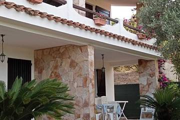 Gîte pour 4 personnes, avec jardin à Porto Pino