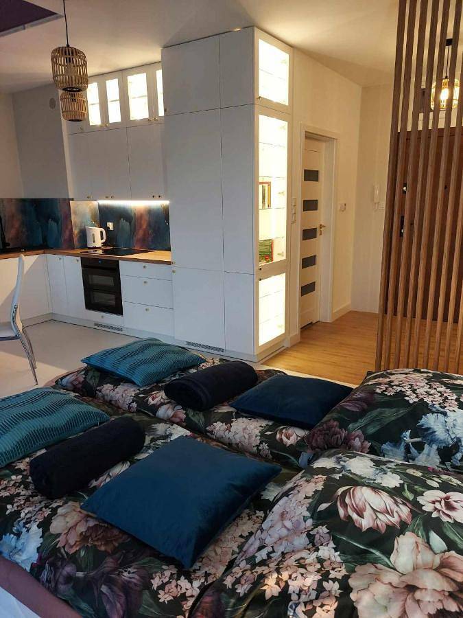 Ferienwohnung für 3 Personen, mit Terrasse und Ausblick sowie Seeblick, mit Haustier in Polen