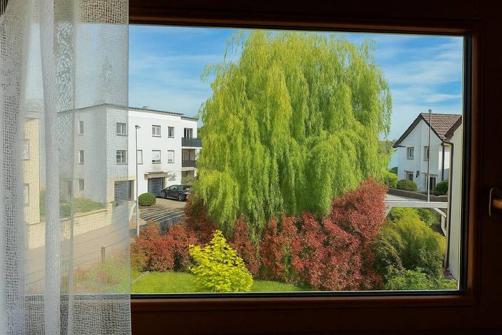 Ganze Wohnung, Blaues Apartment mit zwei Südbalkonen, Gemeinschaftsgarten und WLAN in Bad Krozingen, Südschwarzwald