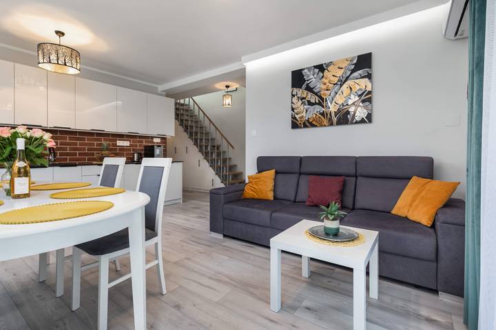Ferienwohnung für 7 Personen, mit Garten in Międzywodzie