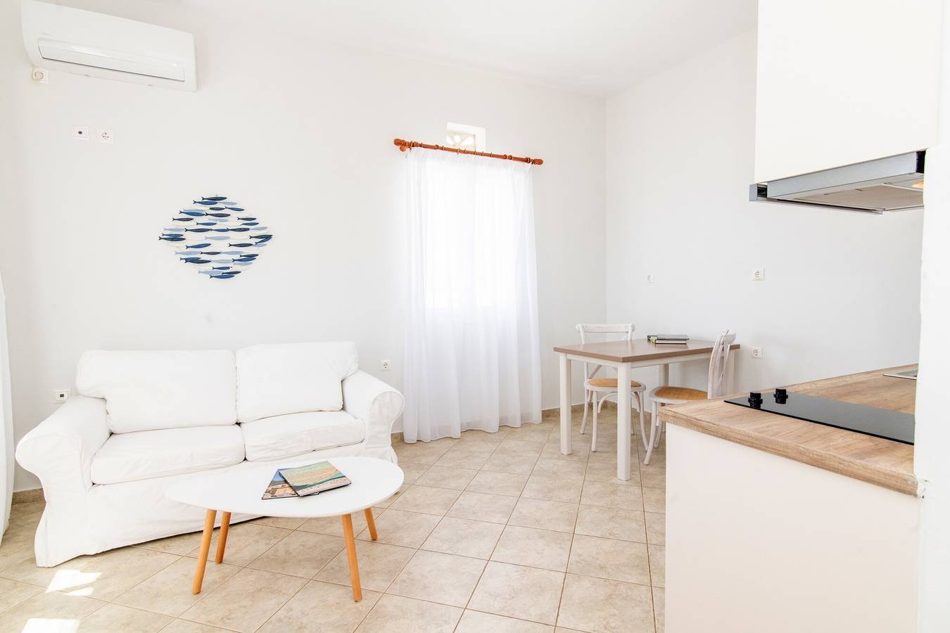 Ferienhaus 'Anemologio 102 Tinos' mit Meerblick, Wlan und Klimaanlage in Ormos Agiou Ioannou, Tínos