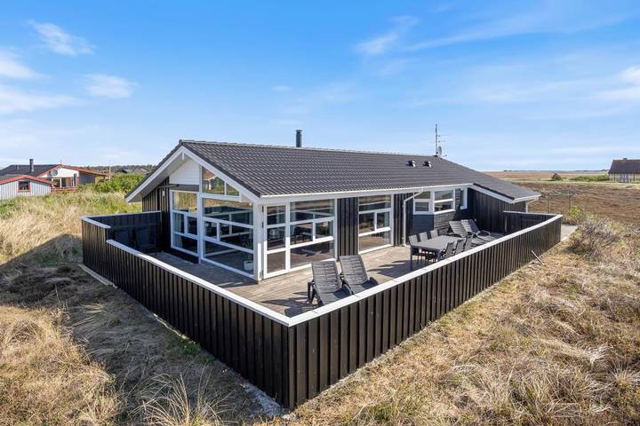 Ferienhaus für 7 Personen, mit Whirlpool und Terrasse sowie Sauna und Ausblick in Holmsland Klit