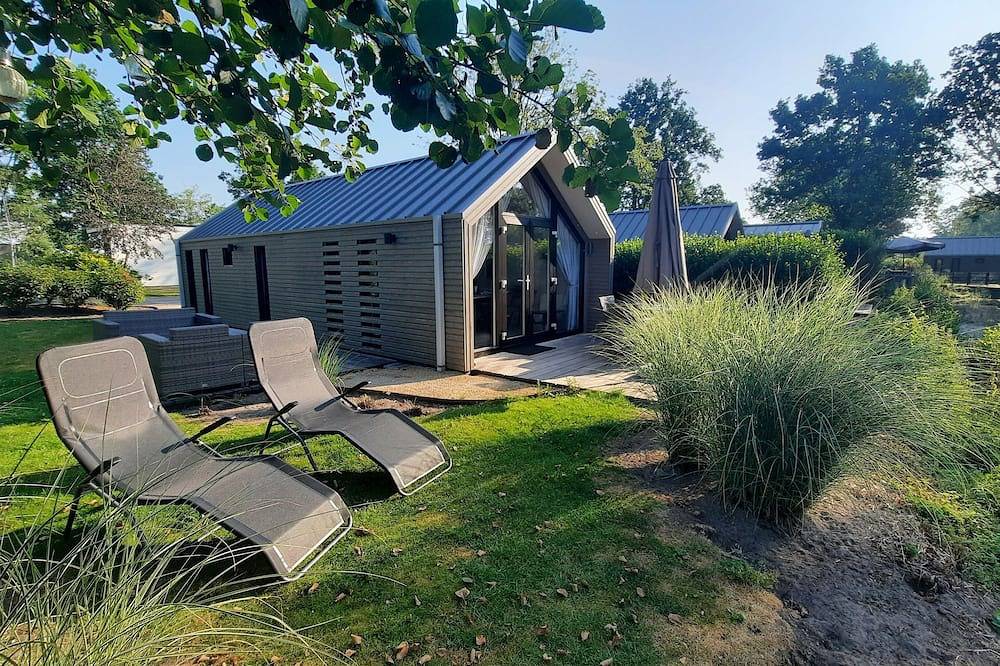 Holland Beachhouse - Modernes Ferienhaus mit Garten, Wasserterrasse. in Veluwe