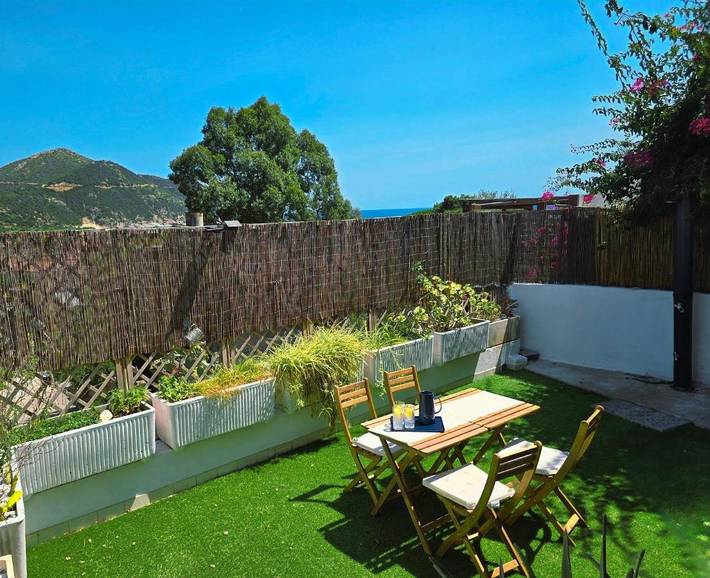 Appartamento per 5 persone, con giardino e panorama, con animali domestici a Solanas